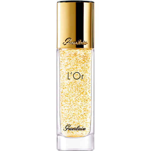 GUERLAIN L'OR Radiance Concentrate With Pure Gold Make-Up Base 30ml. เบสเนื้อเจลใสบางเบา แต่มีประสิทธิภาพในการปรับสีผิวและความเรียบเนียนได้อย่างดีเยี่ยม จึงช่วยให้คุณแต่งหน้าได้อย่างเป็นธรรมชาติ พร้อมส่วนผสมของทองคำ 24K ช่วยให้ผิวดูสว่างส