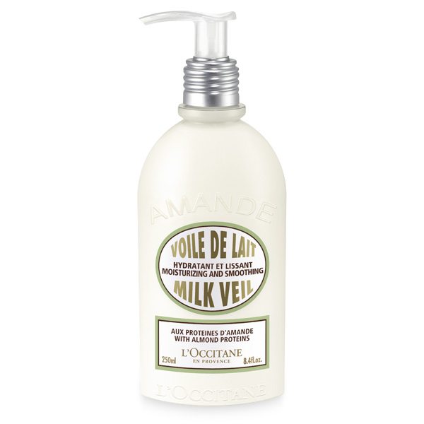 L'OCCITANE Almond Milk Veil 240ml. โลชั่นบำรุงผิวกาย ที่ผสมผสานอัลมอนด์ออยล์และนมด้วยโปรตีนจากอัลมอนด์และซิลิเซียมจะช่วยบำรุงผิวให้นุ่มและกระชับจากด้วยส่วนพิเศษที่รวมไมโครเพิร์ลเพื่อทำให้ผิวกระจ่างใสสีผิวดูสม่ำเสมอ มีกลิ่นหอมของอัลมอนด์