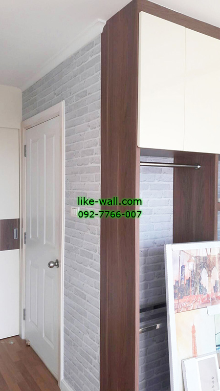 ผลงานติดวอลเปเปอร์ลายอิฐ สีเทา ที่คอนโดLPN พระราม3