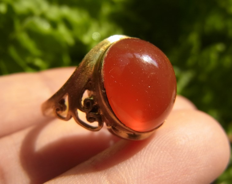 แหวนแก้ววิทรูย์สุริยะประภาสีส้มแดงเนื้อใส เบอร์ 52 ครึ่ง ตัวเรือนทองเหลือง