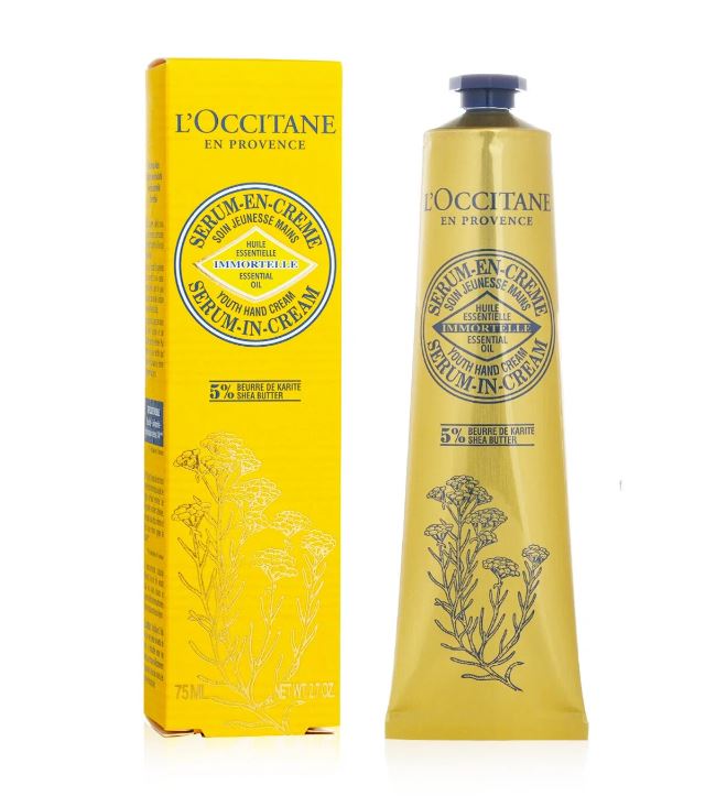 L'OCCITANE Immortelle Youth Hand Cream (Serum in Cream) 75 ml. แฮนครีมตัวใหม่ล่าสุด ช่วยลดเลือนริ้วรอยได้เป็นครั้งแรกที่นำส่วนผสมของดอก Immortelle มาไว้ในครีมบำรุงมือ ให้ผิวมือดูเนียนนุ่ม ช่วยลดเลือนจุดด่างดำ ริ้วรอยดูจางลง มอบสัมผัสของผิวมือที่เรียบ