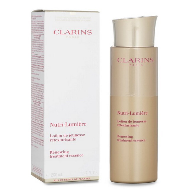 CLARINS Nutri-Lumiere Renewing Treatment Essence 200 ml. โลชั่นลดเลือนริ้วรอยพร้อมปรับสภาพผิวเตรียมผิวให้พร้อมรับคุณประโยชน์จากผลิตภัณฑ์บำรุงผิวในลำดับต่อไป ผิวจะฟื้นคืนความกระจ่างใส แลดูอ่อนเยาว์ยิ่งกว่าที่เคย