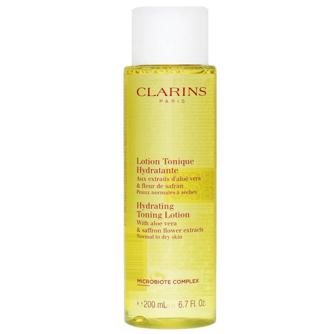 CLARINS Hydrating Toning Lotion 200 ml. โลชั่นปรับสภาพผิวที่ช่วยปรับสมดุลของผิวธรรมดาถึงผิวแห้ง เพื่อผิวที่ชุ่มชื้นและสวยงามสูตรอ่อนโยนและสดชื่น อุดมไปด้วยสารสกัด สารสกัดจากว่านหางจระเข้ Aloe Vera และดอกหญ้าฝรั่น Saffron Flower ช่วยให้ผิวนุ่มนวลดุจกำมะหยี