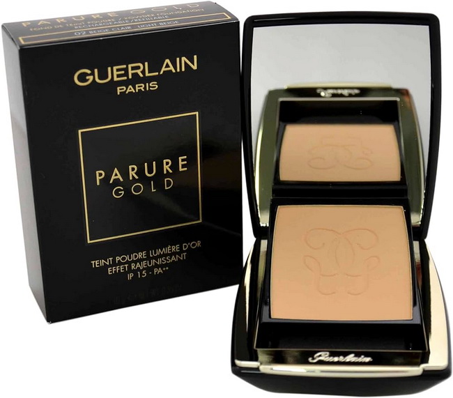 GUERLAIN Parure Gold Compact Foundation 10 g. แป้งผสมรองพื้นที่มีส่วนผสมของทองคำและคุณค่าจากน้ำมันยางไม้หอมเพื่อผิวที่แลดูเรียบเนียน เปล่งประกาย และ แลดูอ่อนเยาว์มีชีวิตชีวา พร้อมช่วยปกปิดจุดบกพร่องได้อย่างเนียนสนิทไร้ที่ติ