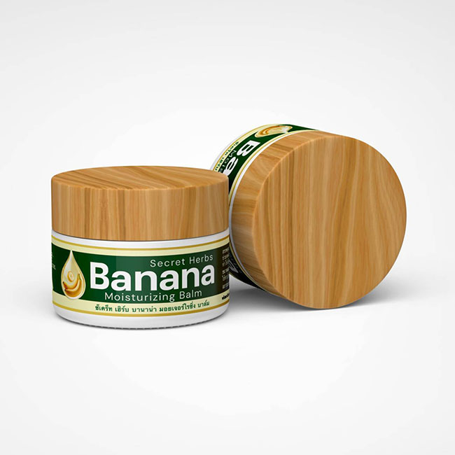 Secret Herbs Banana Moisturizing Balm 50 g. ซีเคร็ท เฮิร์บ บานาน่า มอยเจอร์ไรซิ่ง บาล์ม ครีมกล้วยทาส้นเท้าแตกเนื้อบาล์มครีมเนื้อเข้มข้นผลิตจากสารสกัดสมุนไพรไทยหลากหลายชนิด ส่วนผสมหลักสารสกัดจากเปลือกกล้วยหอม เพื่อดูแลปัญหาผิวส้นเท้าแห้งกร้าน ช่วยลอกผิวและ