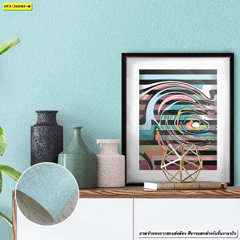 รูปติดผนังศิลปะแอบสแตรกต์สีสดใสคู่กับวอลเปเปอร์โทนสีฟ้า เติมเต็มพลังงานและความมีชีวิตชีวาให้ตัวห้อง