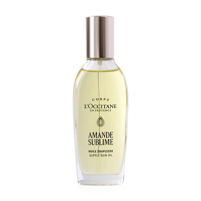 L'Occitane Amande Sublime Supple Skin Oil 100ml บอดี้ออยล์บำรุงผิวกาย ไอเท็มที่ขายดีที่สุดของล็อกซิทาน อุดมด้วยน้ำมันอัลมอนด์เข้มข้น 50% และน้ำมันคามิลินาที่อุดมไปด้วยโอเมก้า 3 และ 6 แบบเข้มข้น จึงช่วยให้ผิวรู้สึกได้รับการบำรุงอย่างล้ำลึก ให้ผิวเนียน