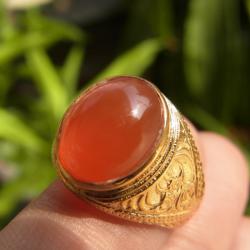 แหวนแก้ววิทรูย์สุริยะประภาสีส้มเนื้อใส เบอร์ 54 ครึ่ง ตัวเรือนทองเหลือง