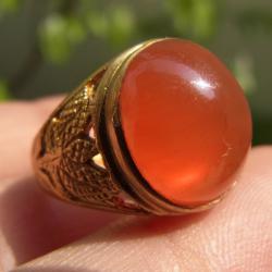 แหวนแก้ววิทรูย์สุริยะประภาสีส้มเนื้อใส เบอร์ 57 ครึ่ง ตัวเรือนทอองเหลือง